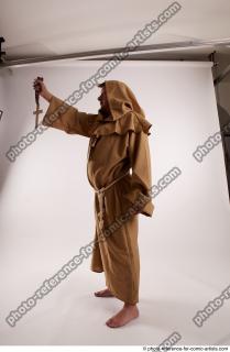 JOEL_ADAMSON MONK WITH CRUCIFIX